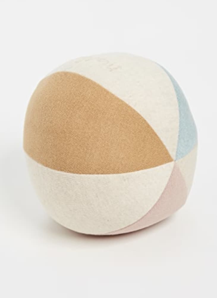 This Living Room Textile Trend Is Surprising and Stylish Ball Pillow